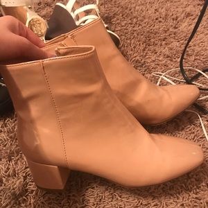 Nude patent leather booties